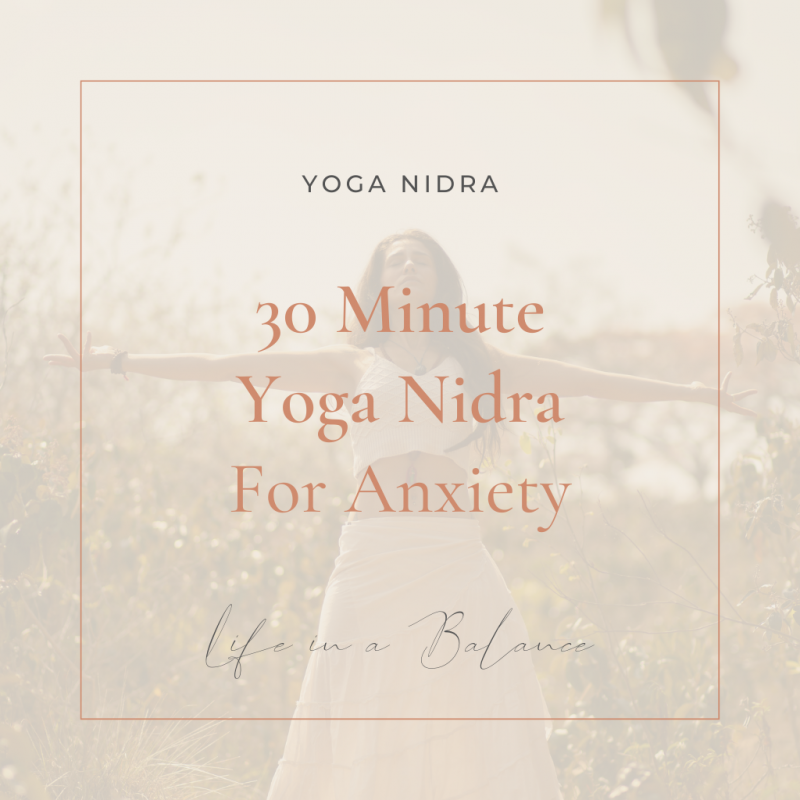 30 minute yoga nidra for anxiety text on top of a background image of woman with her arms open in a field and Life in a Balance logo